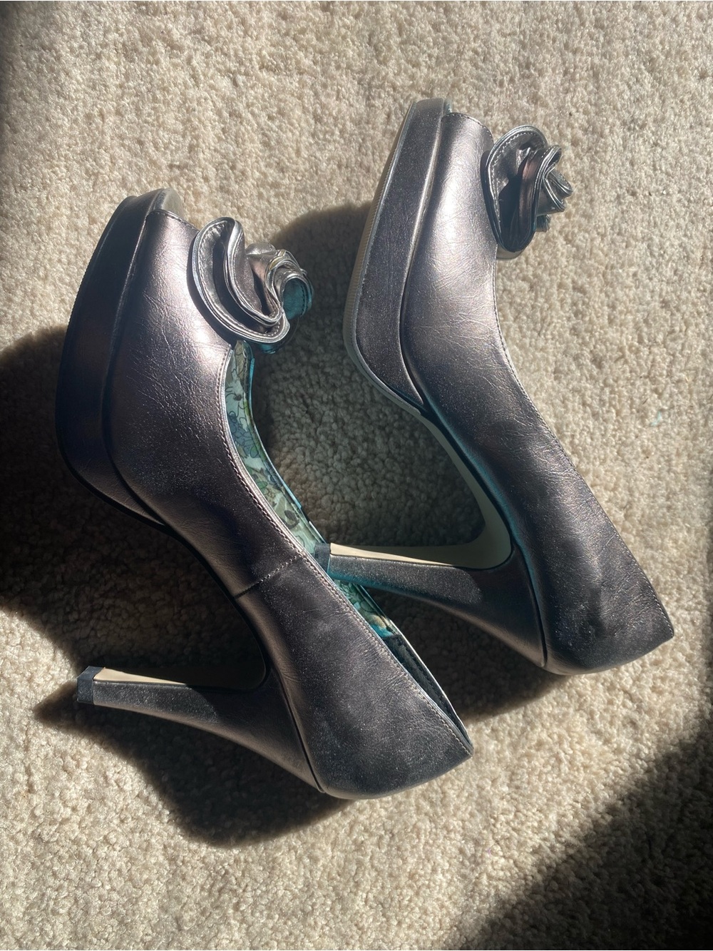 Madden girl Women's Metallic Gray Platform Heels with Rosette Accent